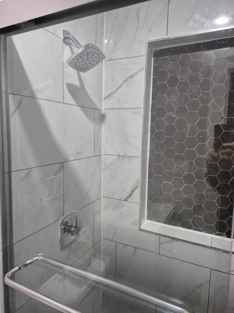Shower glass stains and buildup cleaned
