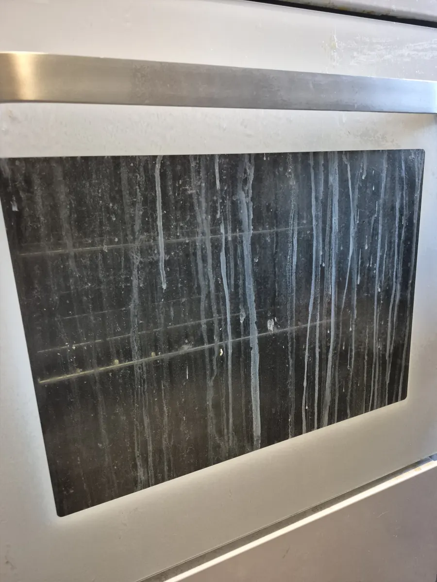 Oven Door Before Cleaning